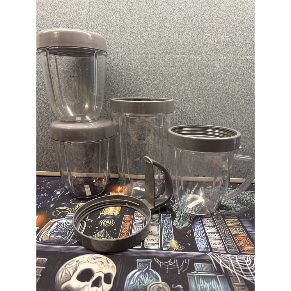 Nutribullet Lot Of 4 Replacement Cups With Lids